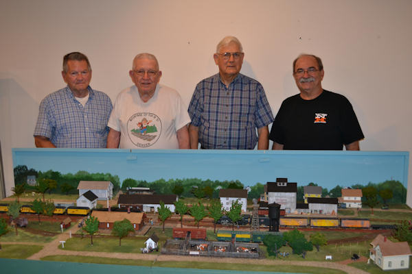 Train modelers with their diorama